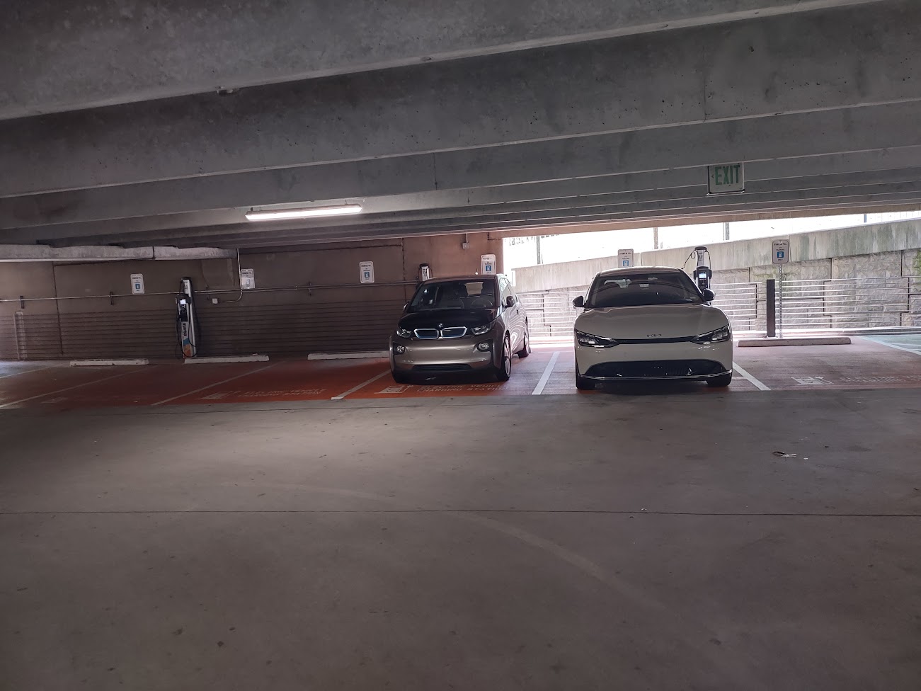 EV parking spots at the MARTA garage showing six spot with two vehicles.